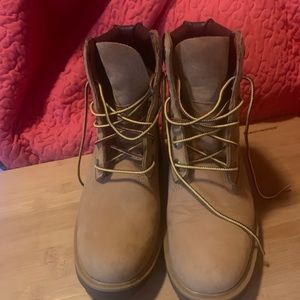 Timberland boots for women. Size 8. Has higher feminine heel! Like new.